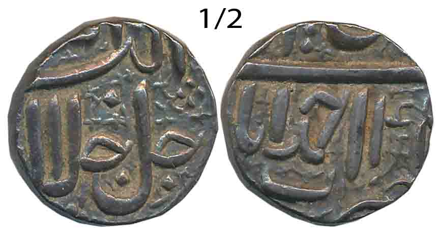 Akbar Silver 1/2 Rupee, 5.70g, “Jalalahu” type, Ahmedabad Mint, Year 4X (KM# 66.1). Very f
