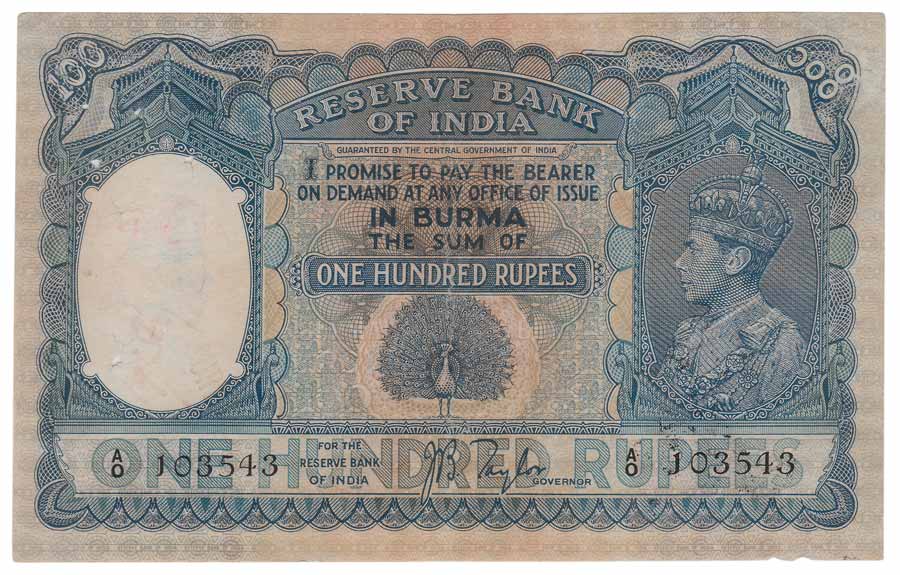 George VI, Rs. 100, Sign JB Taylor, Prefix A0, Peacock issue (Jhun# 6.1). Pin holes, folde