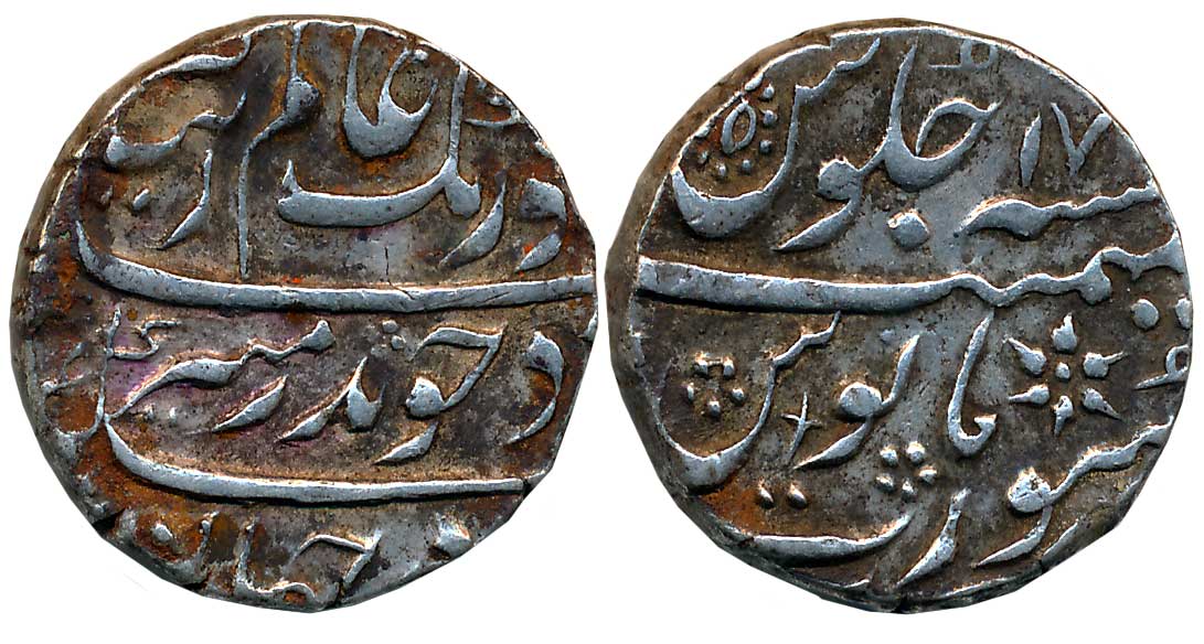 Aurangzeb, Silver Rupee, 11.44g, Surat Mint, RY 17 (KM# 300.86). Beautiful rossets on reve