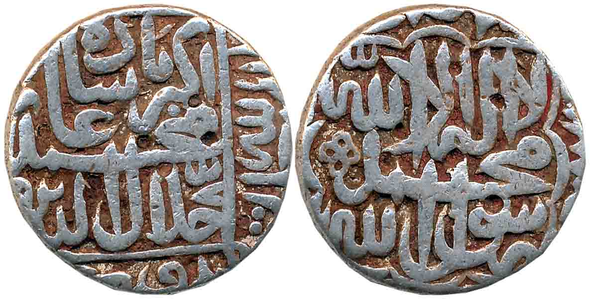 Akbar, Silver Rupee, 11.14g, “Kalima” type, Mint off flan, AH 985. Very fine+.