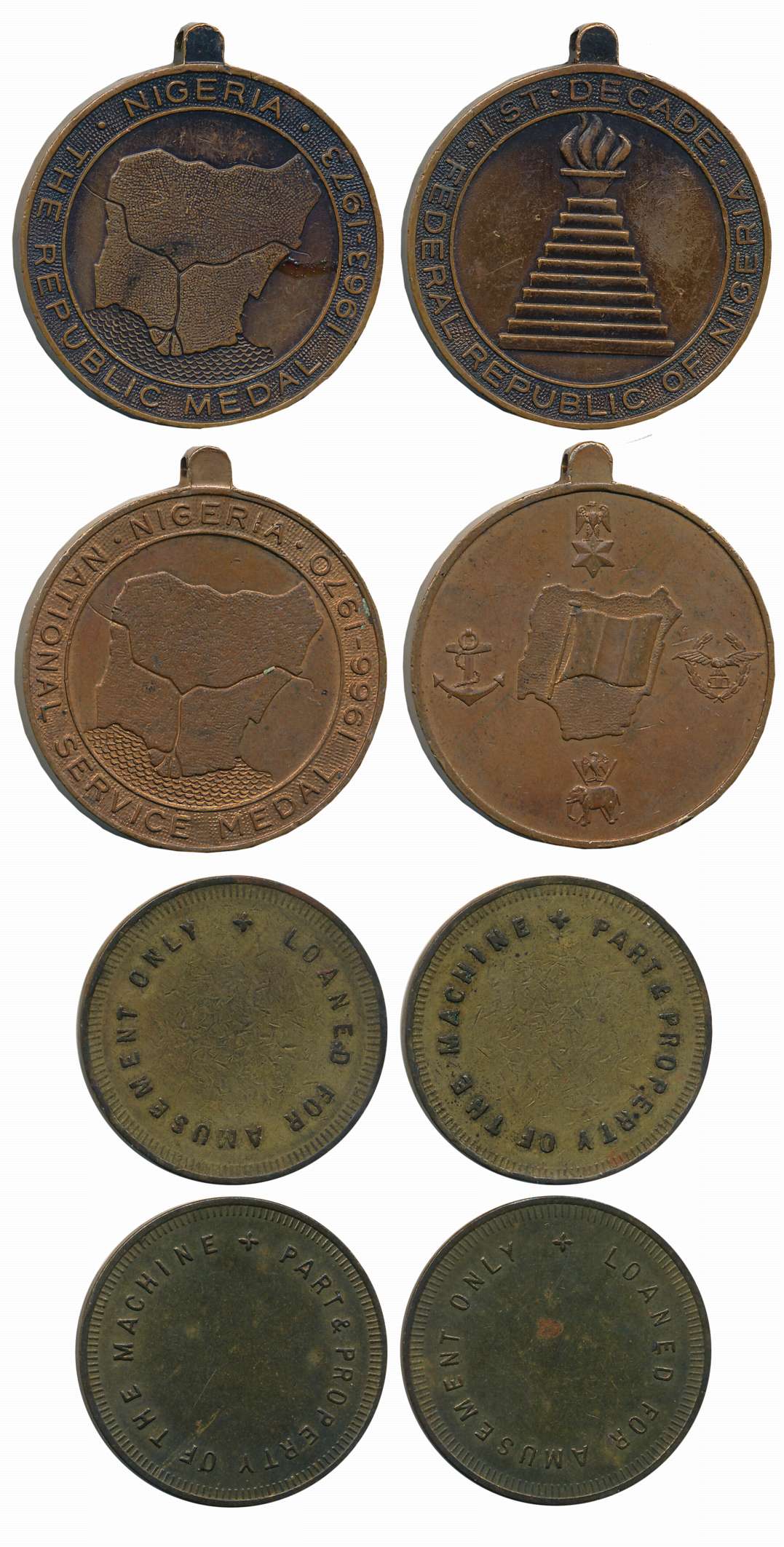 Bronze (4), Nigeria (2), The Republic Medal, 1970, 1973 & Amusement Token (2). Very fine+.