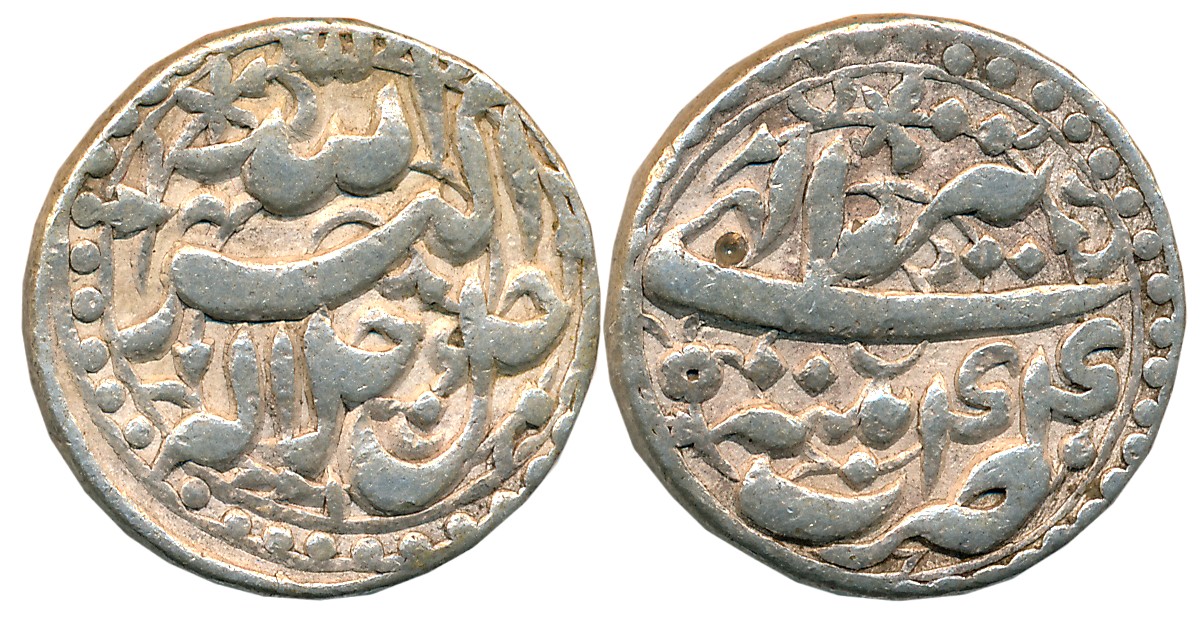 Akbar, Silver Rupee, 11.24g, “Jalallahu” type, broad flan, Patna Mint, Ilahi Month Tir, Ye