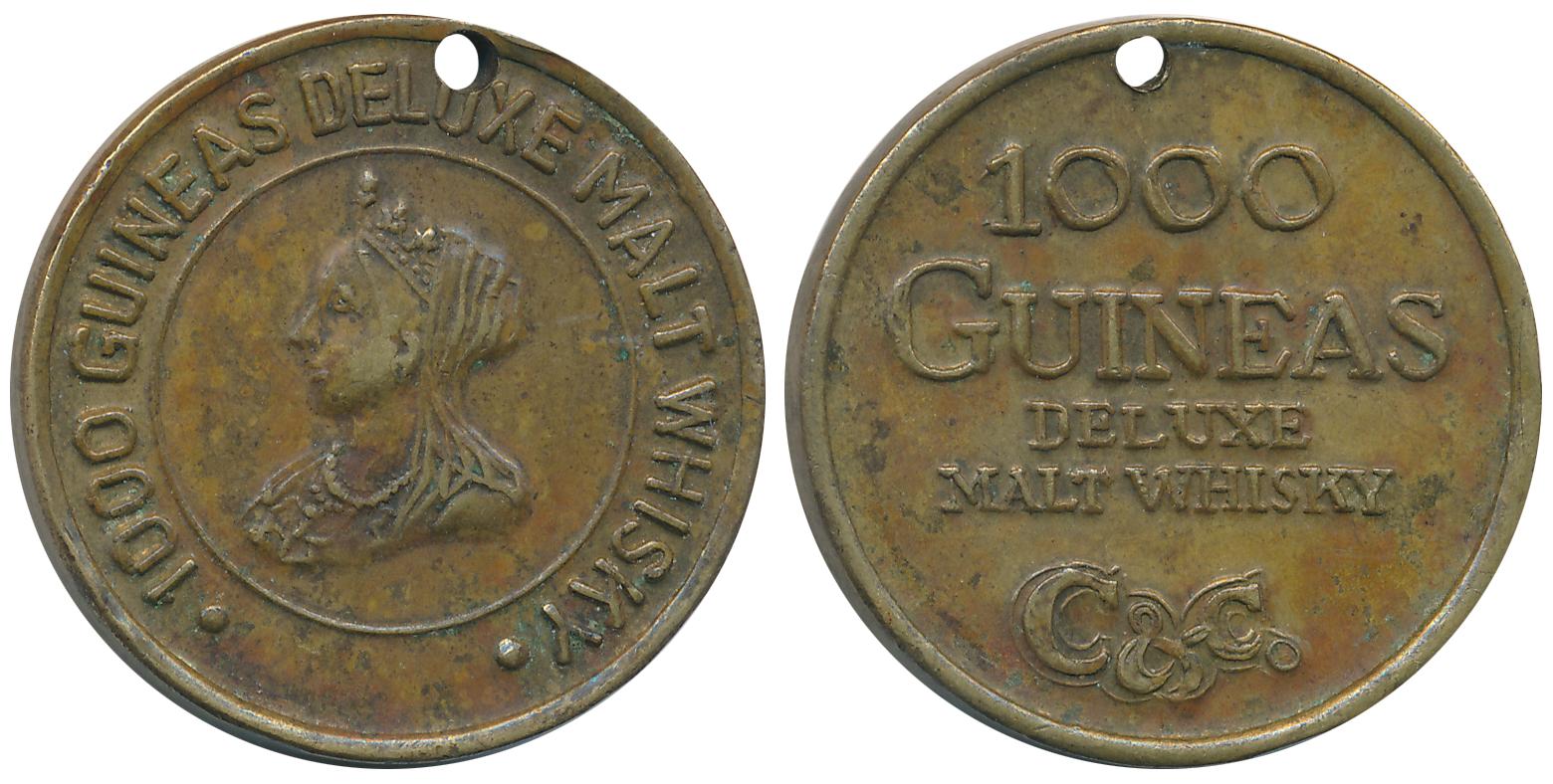 Vintage 1000 Guineas Deluxe Malt Whiskey Token, Bronze, 16.98g. Very fine.