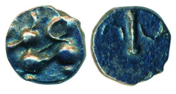 Chalukyas, Silver, 0.27 g, a stylized lion seated to left on obv, a character on rev. Abou
