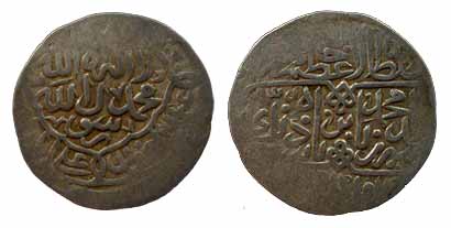 Babur, Silver, Shahrukhi, AH 93x, mint name is erased from the flan. Fine+, Scarce.