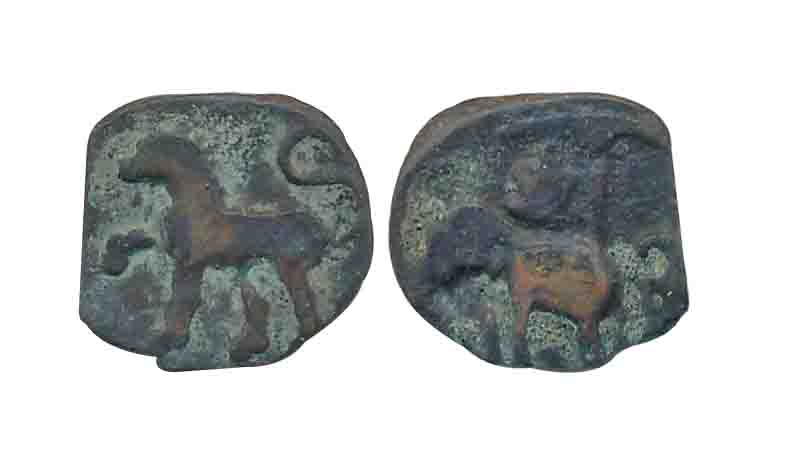 Sangam, age Chola, Copper, 0.90g, Obv: Lion to left with upraised tail, Rev: Elephant to l