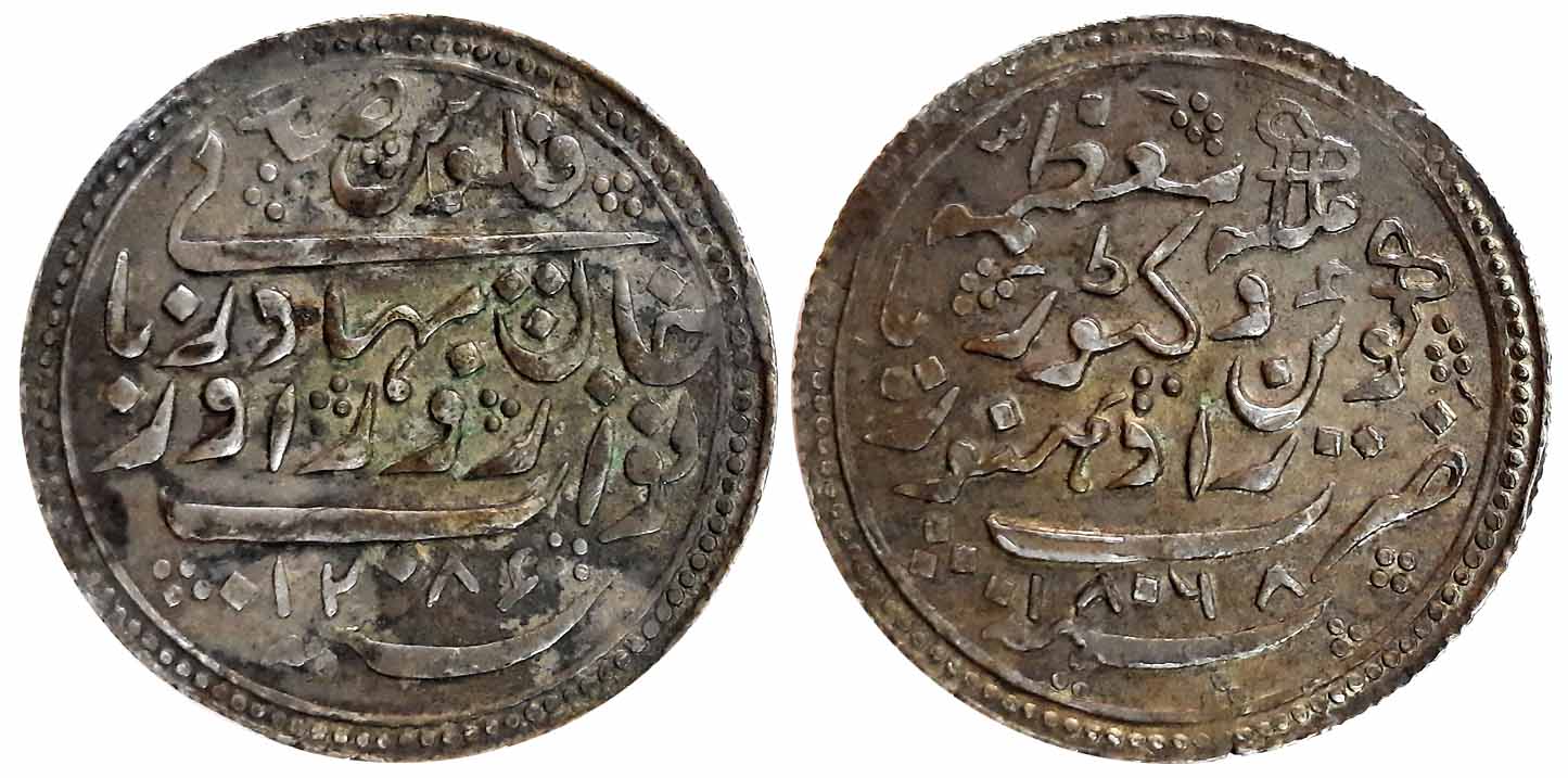 Zorawar Khan, Silver 100 Falus, 11.63g, with the name of Queen Victoria, AH 1286/ AD 1868.